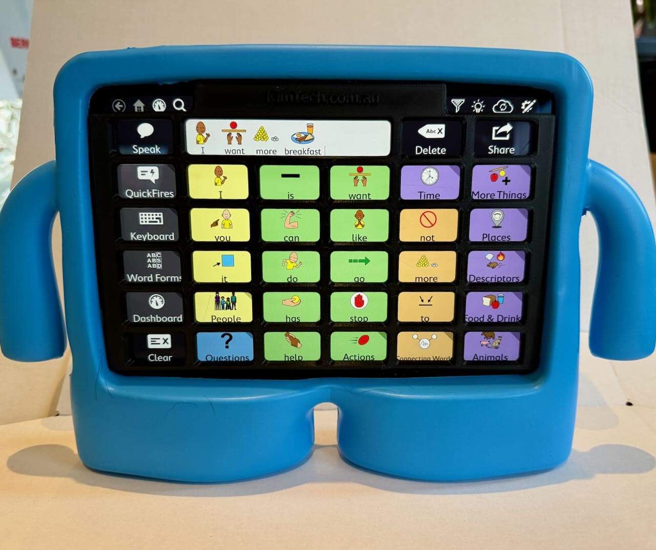 A black keyguard on an iPad mini in a Otto Bumper case. The app displayed on the iPad is TD Snap with the Motor Plan 30 page set.